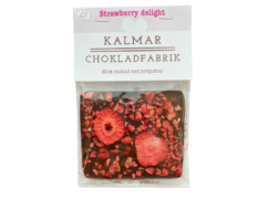 En bild som visar Mini Strawberry delight- minichokladkaka med mörk choklad och jordgubbar från Kalmar Chokladfabrik